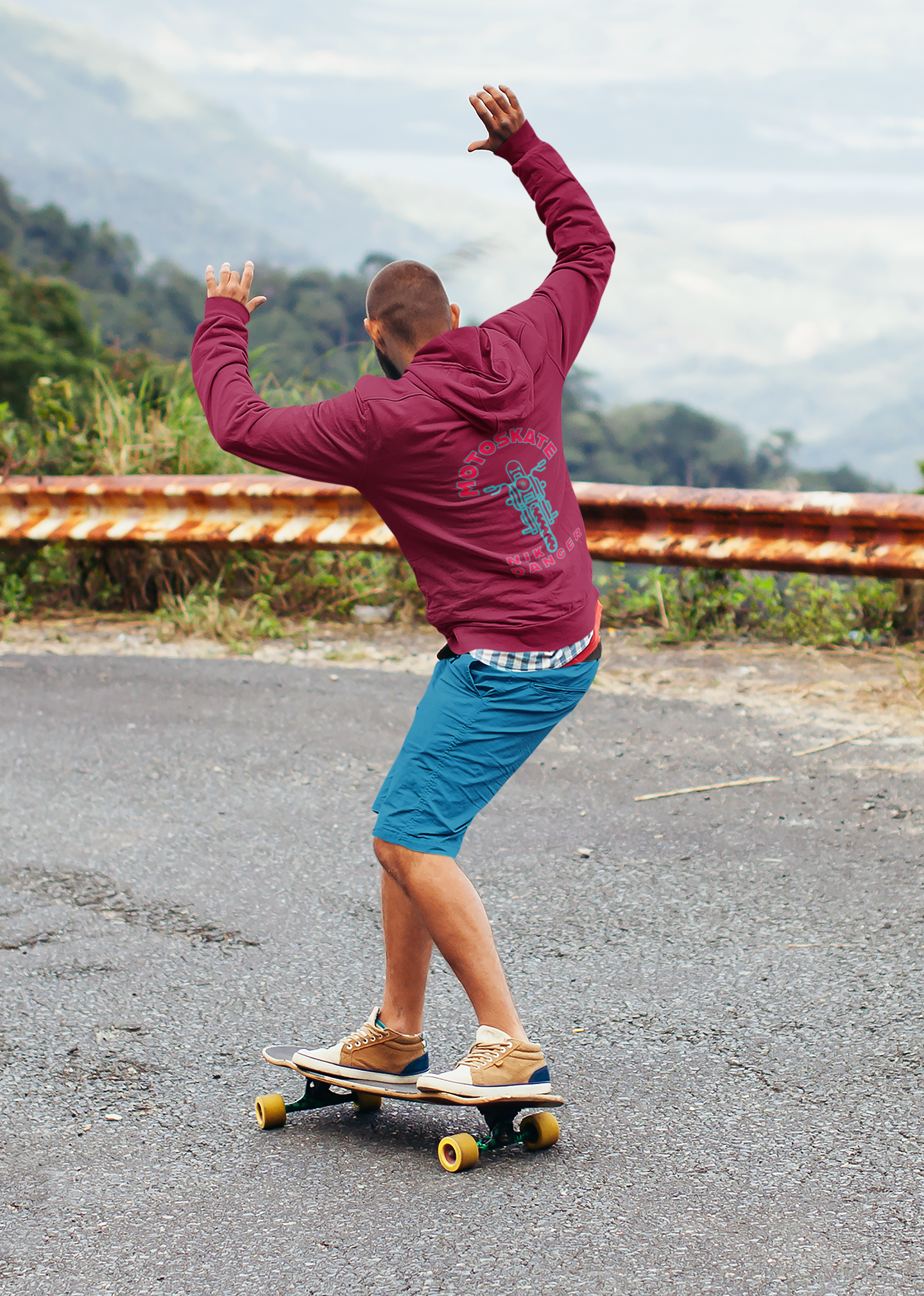 man on skate board with comfortable light weight hoodie by Nik Danger